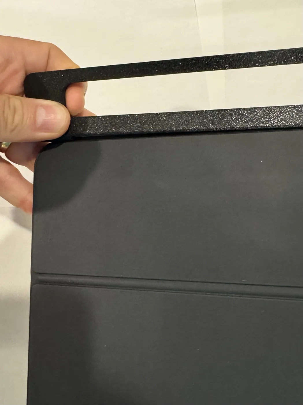 Sliding the left side of the stabilizer onto the keyboard